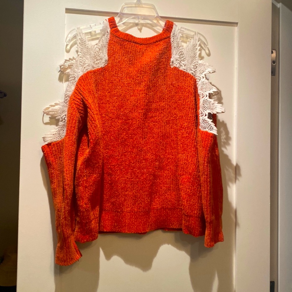 Size Medium but fits like a large. SHEIN knit sweater.